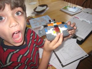 Lately, Indie's new obsession is Lego Star Wars.  Here, he's made his own ship