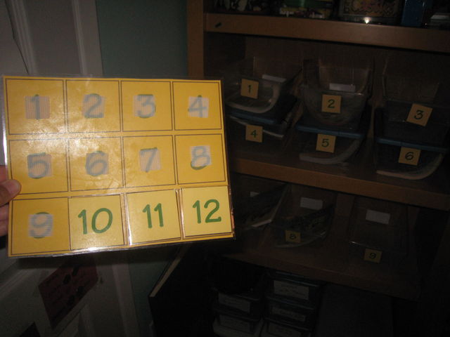 I hung this on the wall right next to Indie's Shelves so he can visually see what he has to accomplish for that day.  Today, I only filled 9 boxes so you see 10-12 already on the chart.  